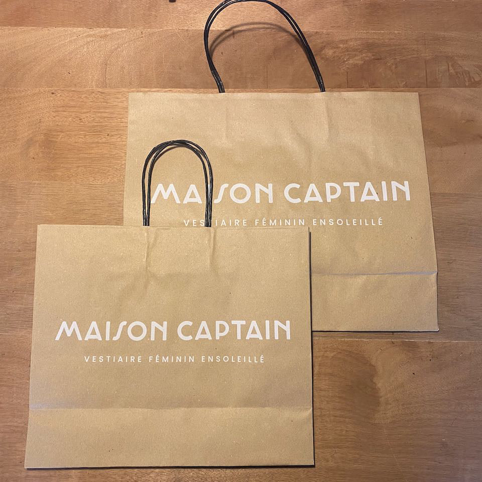 Papiertasche mit MAISON CAPTAIN Branding