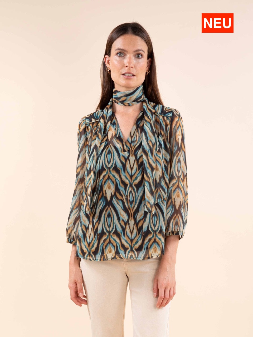 Fließende Bluse mit Pfauenprint